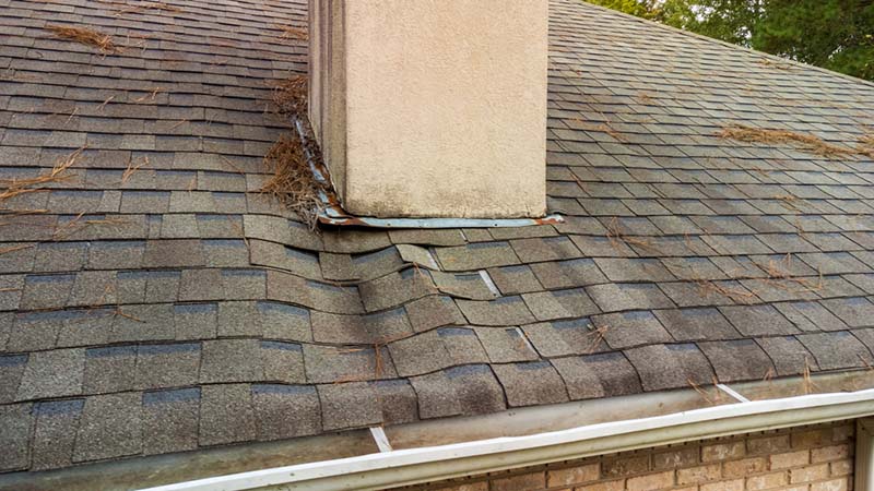 Stock Image -chimney water damage-Central Masonry & Chimney water damaged roof