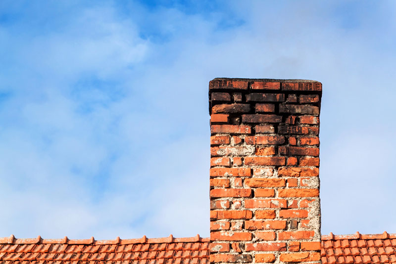 old chimney covered in soot