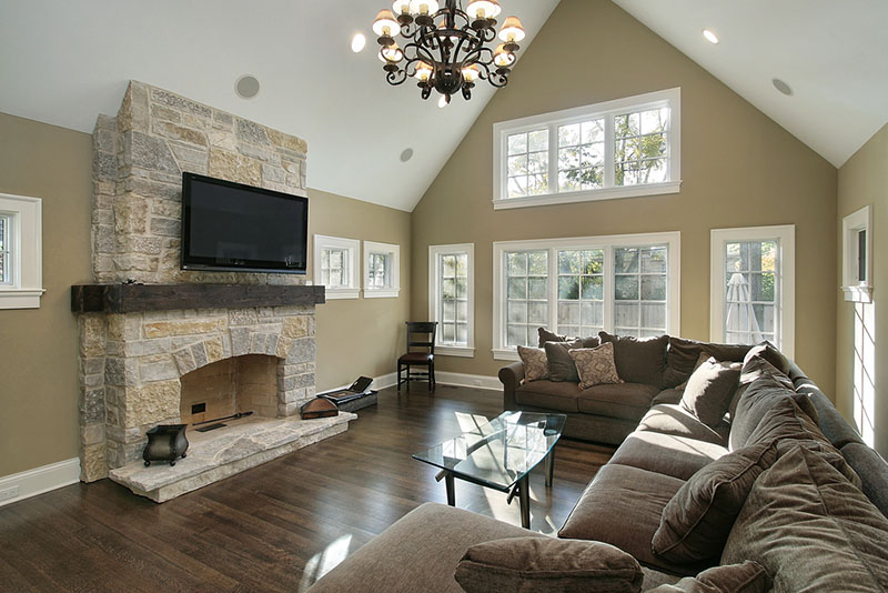 Central Masonry Stock Image of a rock fireplace fireplace in living room